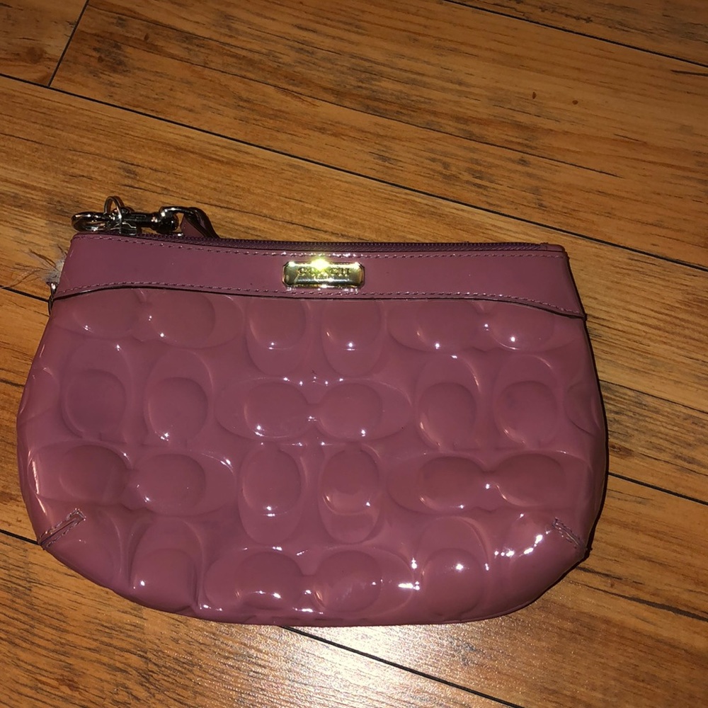BEAUTIFUL PURPLE COACH WRISTLET